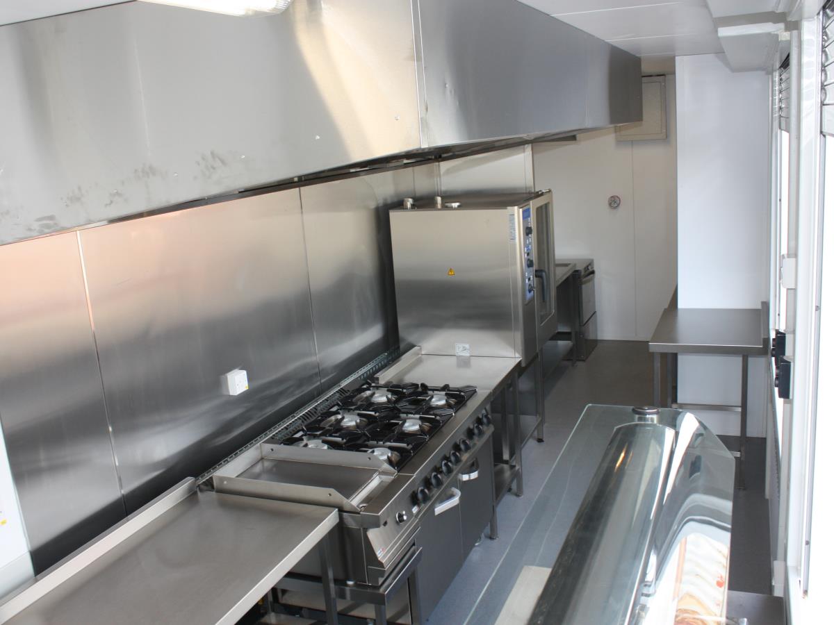 Example interior view of our shipping container kitchen for worldwide overseas deployment.